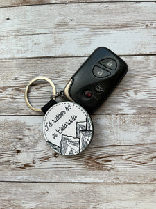 I'd Rather be in Colorado 2 Inch Round Leather Keychain